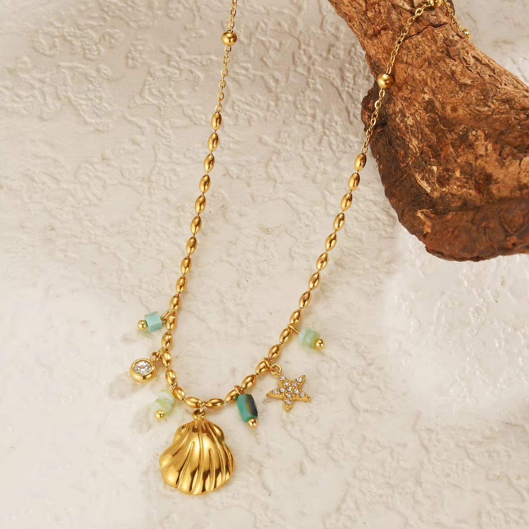 Ocean Whispers – 18K Gold Plated Shell Charm Necklace with Green Beads