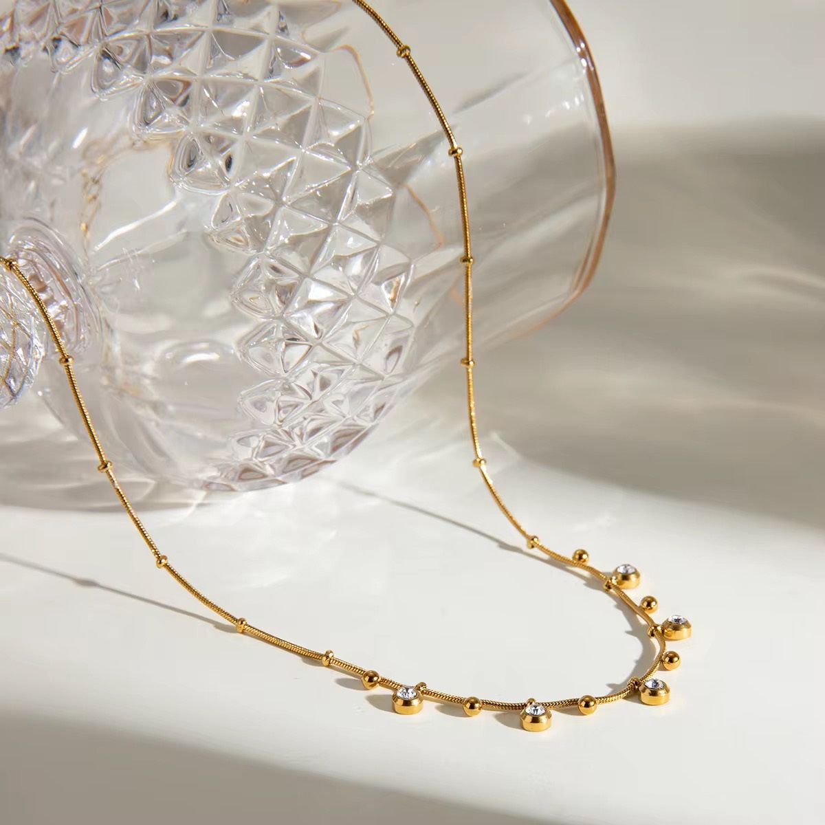 Celestial Glow: 18k Gold Plated White Zircon Solitaire Pendant Necklace